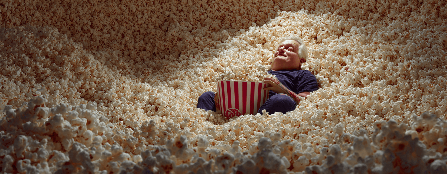Man enjoying popcorn - Bad Popcorn AI Visibility