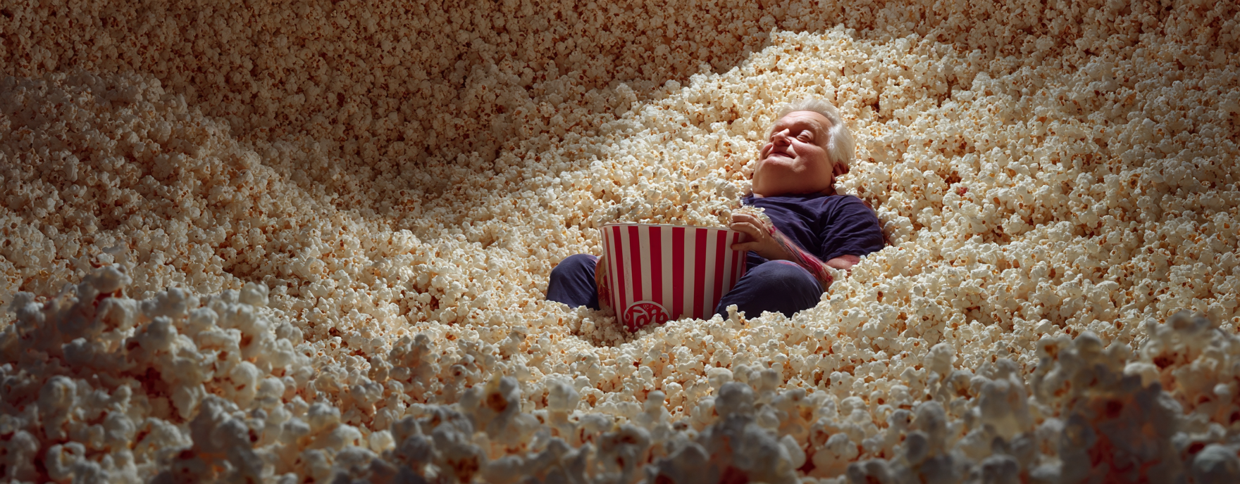 Man enjoying popcorn - Bad Popcorn AI Visibility